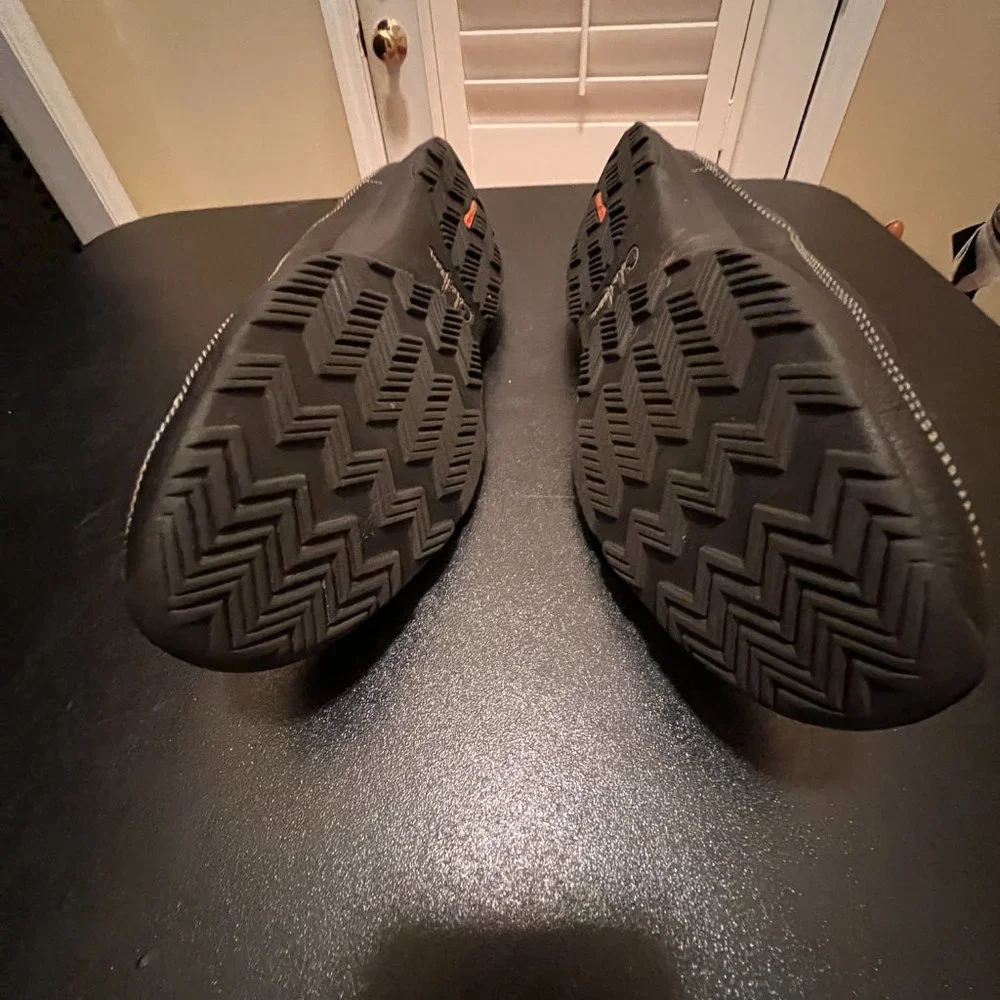 Cole Haan size 9.5 mens slip on black leather shoes